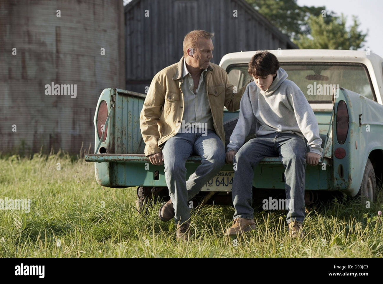 MAN OF STEEL 2013 Warner Bros film with Kevin Costner as Jonathan Kent and Dylan Sprayberry as the 13 year old Clark Kent Stock Photo