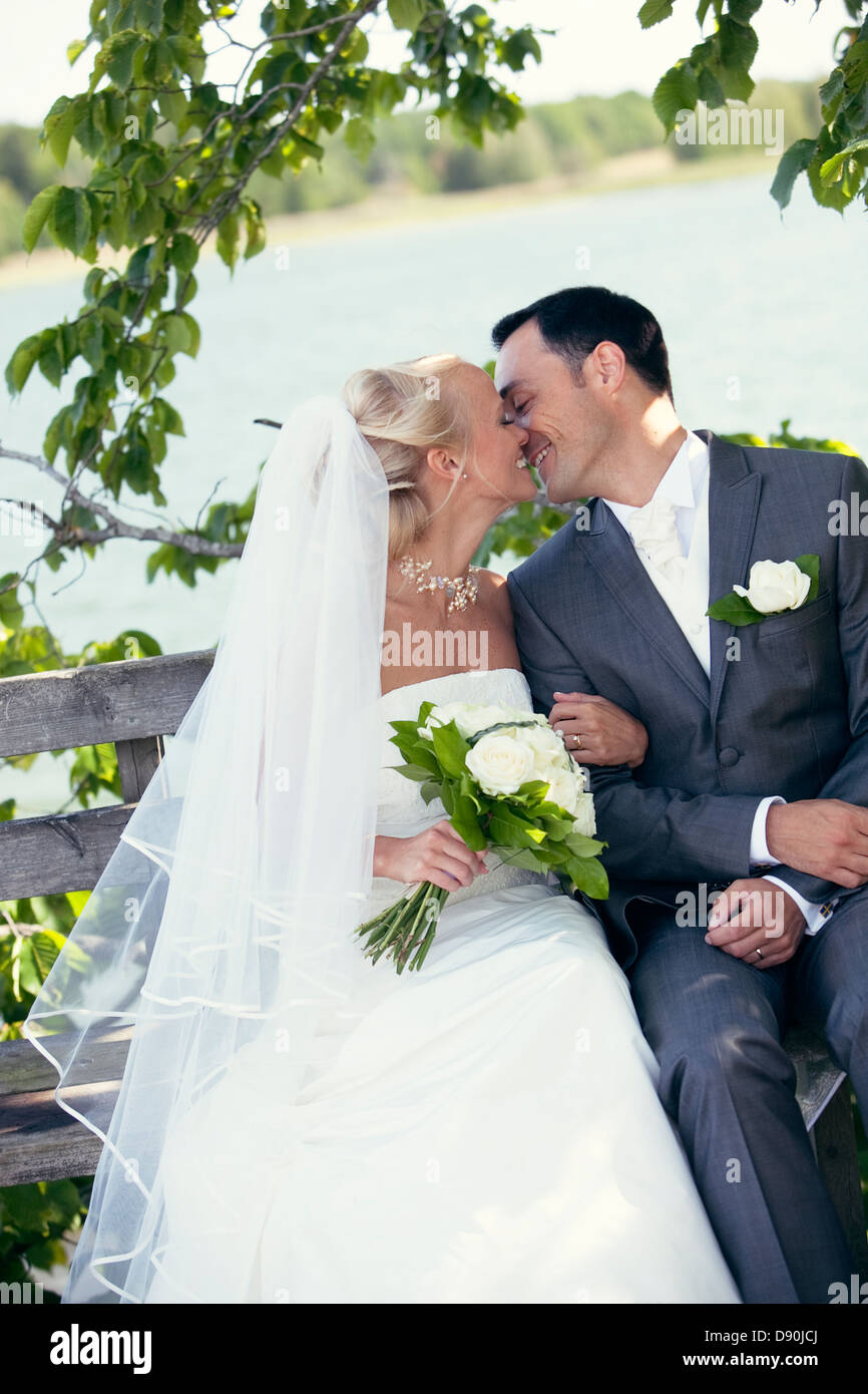 Bride and groom kissing Stock Photo