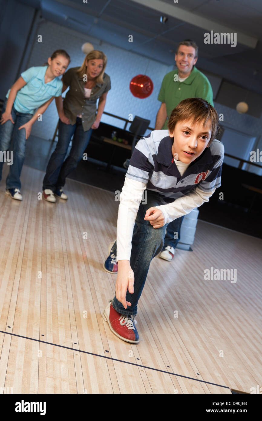 Family in a bowling alley. Stock Photo