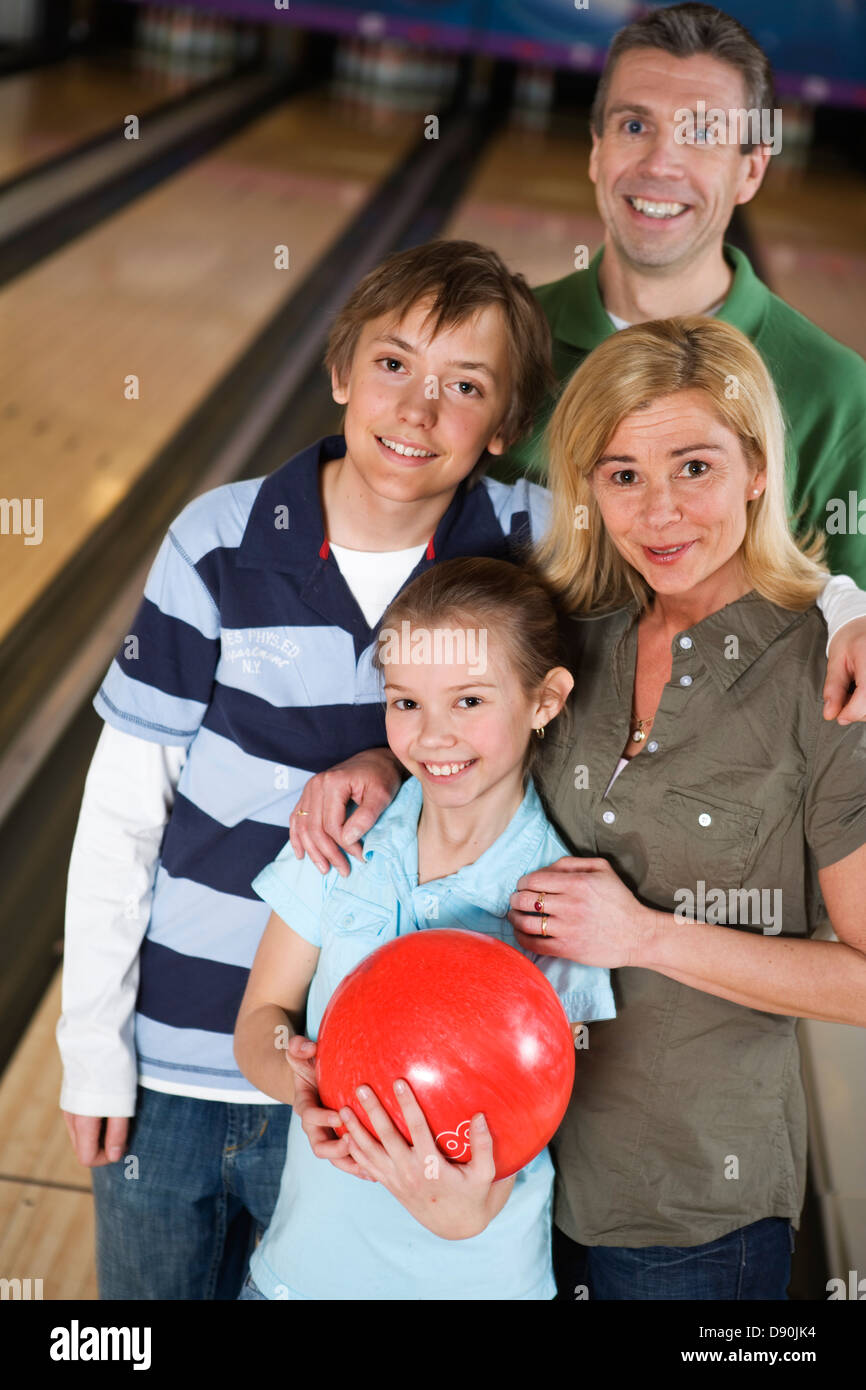 A family in a bowling alley. Stock Photo