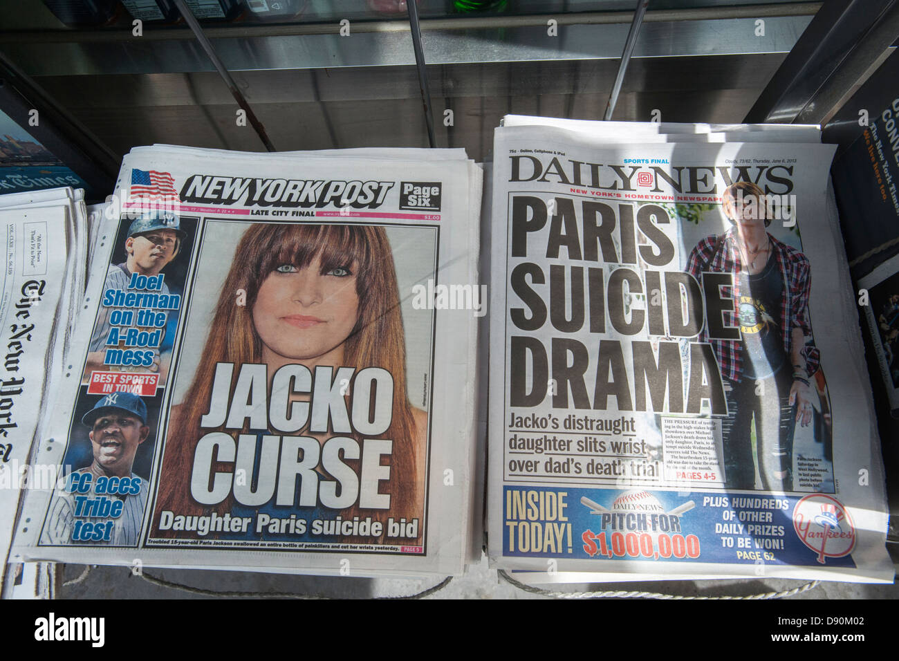Front pages of the New York Daily News and the New York Post cover the previous days attempted suicide of Paris Jackson Stock Photo