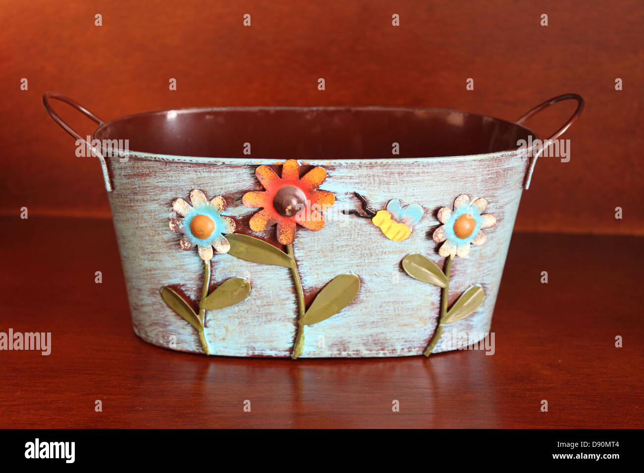 Decorated metal basket for flowers Stock Photo Alamy