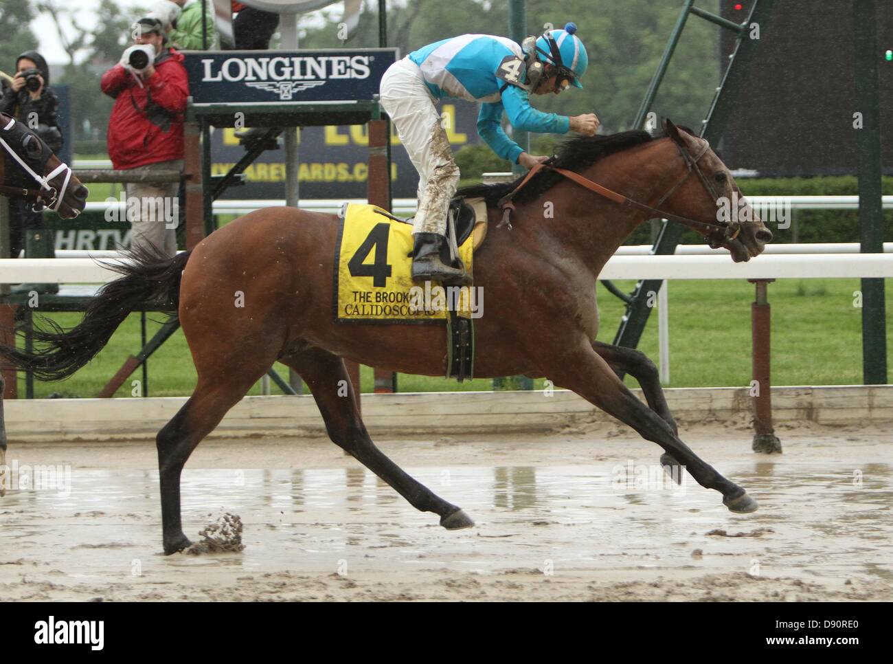 June 7, 2013 - Elmont, New York, U.S. - Calidoscopio with Aaron Gryder score a mild upset in the 125th running of the Grade II Brooklyn Handicap for 3-year olds & up, going 1 1/2 mile, at Belmont Park.  Trainer Mike Puype  Owners Donna Pancha (Credit Image: © Sue Kawczynski/Eclipse/ZUMAPRESS.com) Stock Photo