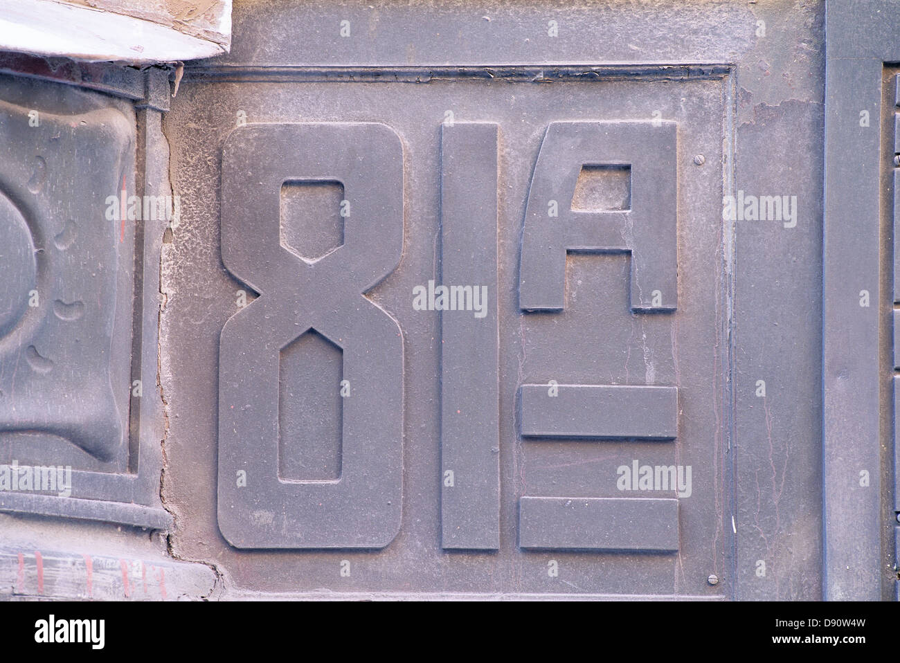 Digits on wall Stock Photo