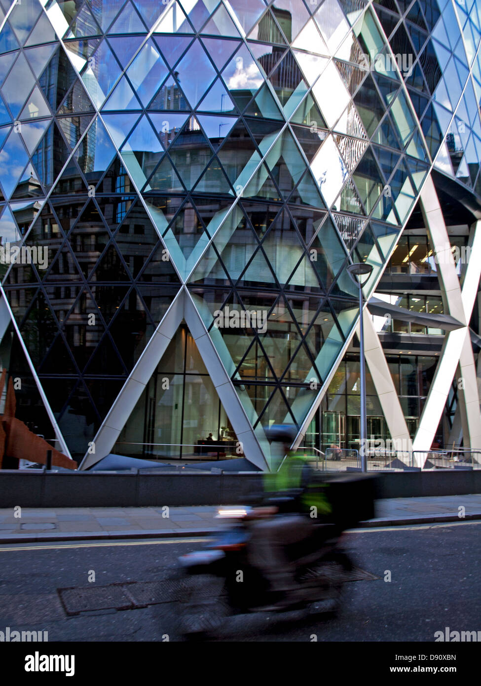View of 30 St Mary Axe (the Gherkin,Swiss Re Building) showing entrance,City of London,London,England,United Kingdom Stock Photo