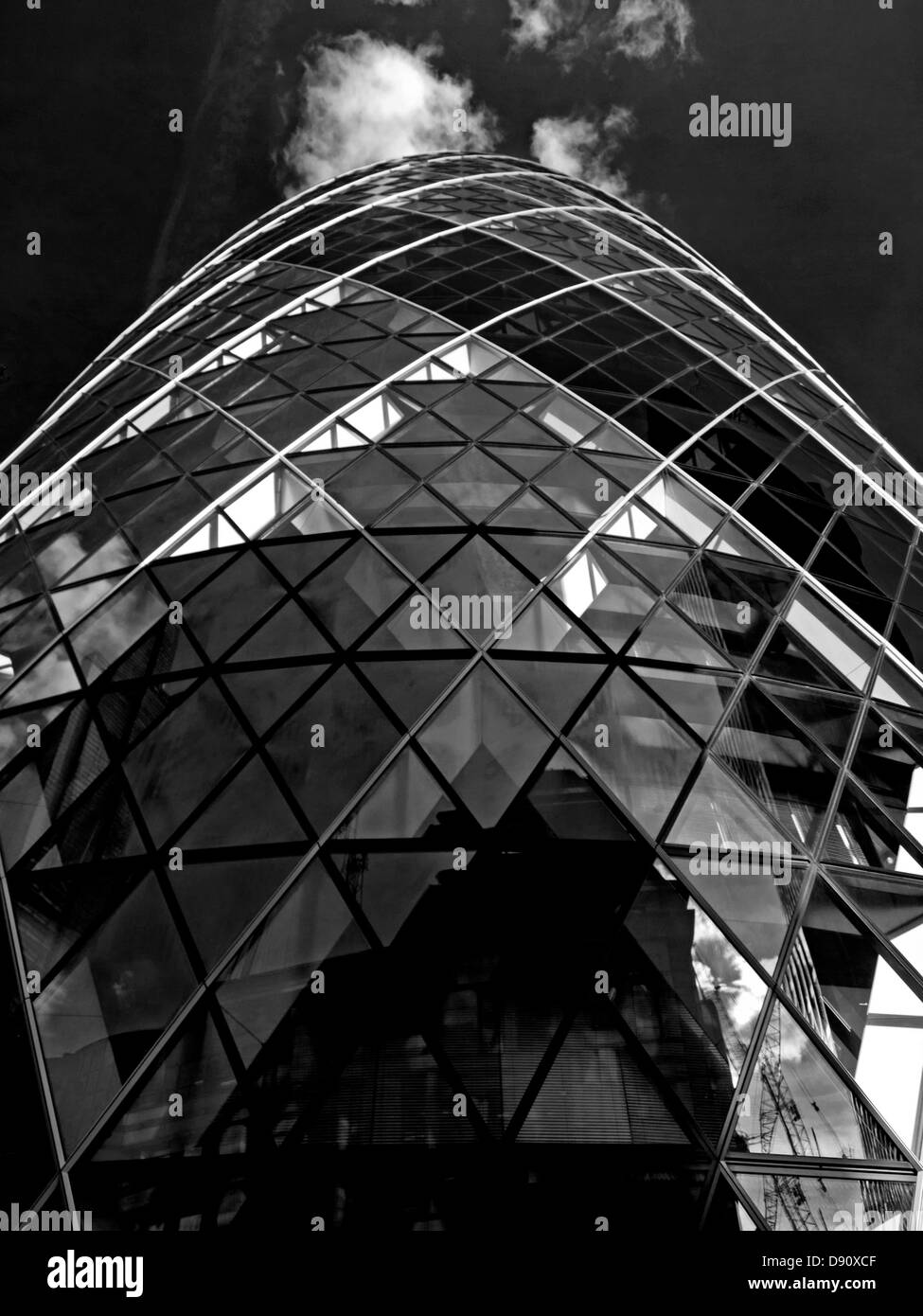 Black and white view of 30 St Mary Axe (the Gherkin,Swiss Re Building),City of London,London,England,United Kingdom Stock Photo