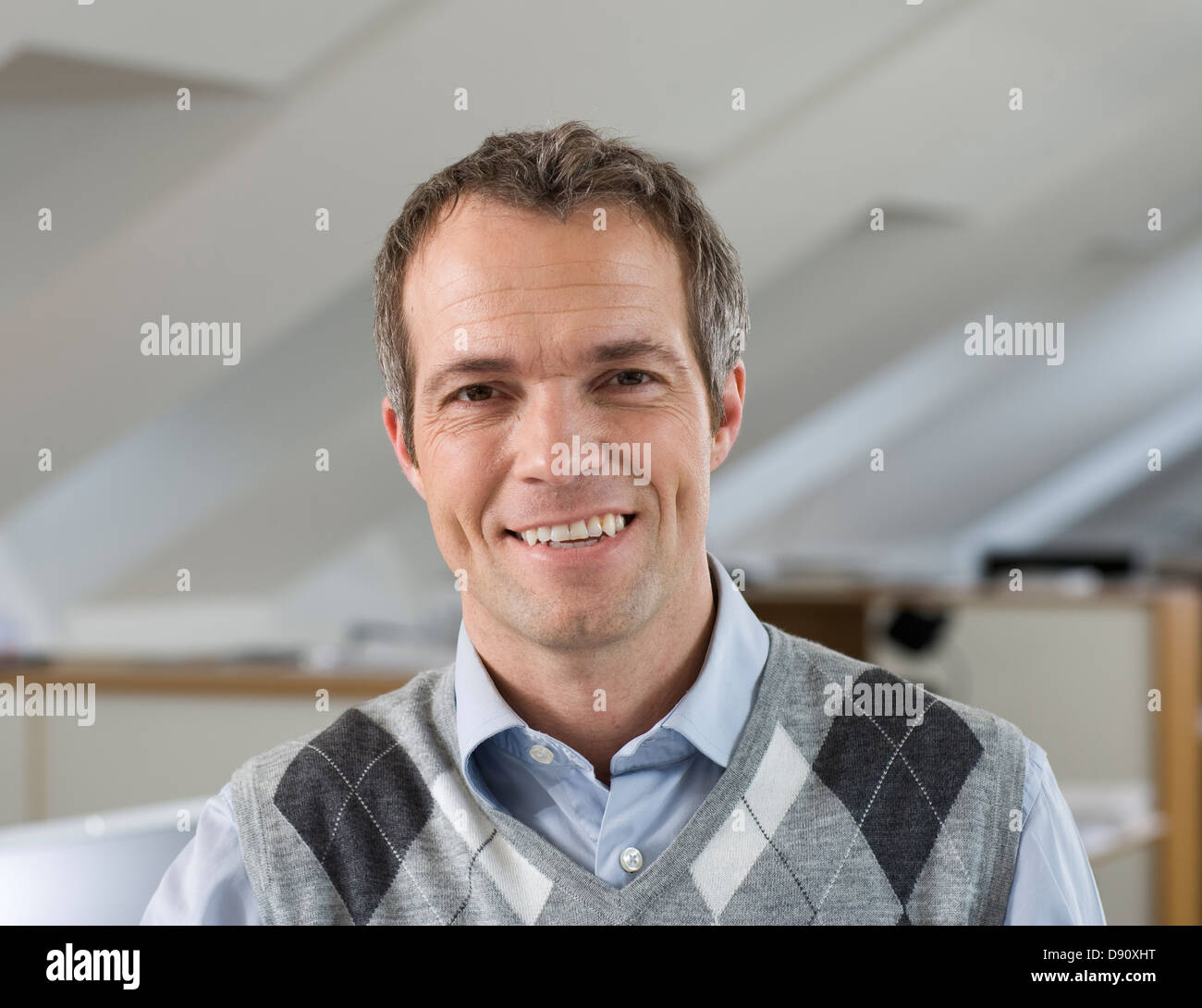 Portrait of smiling man in office Stock Photo - Alamy