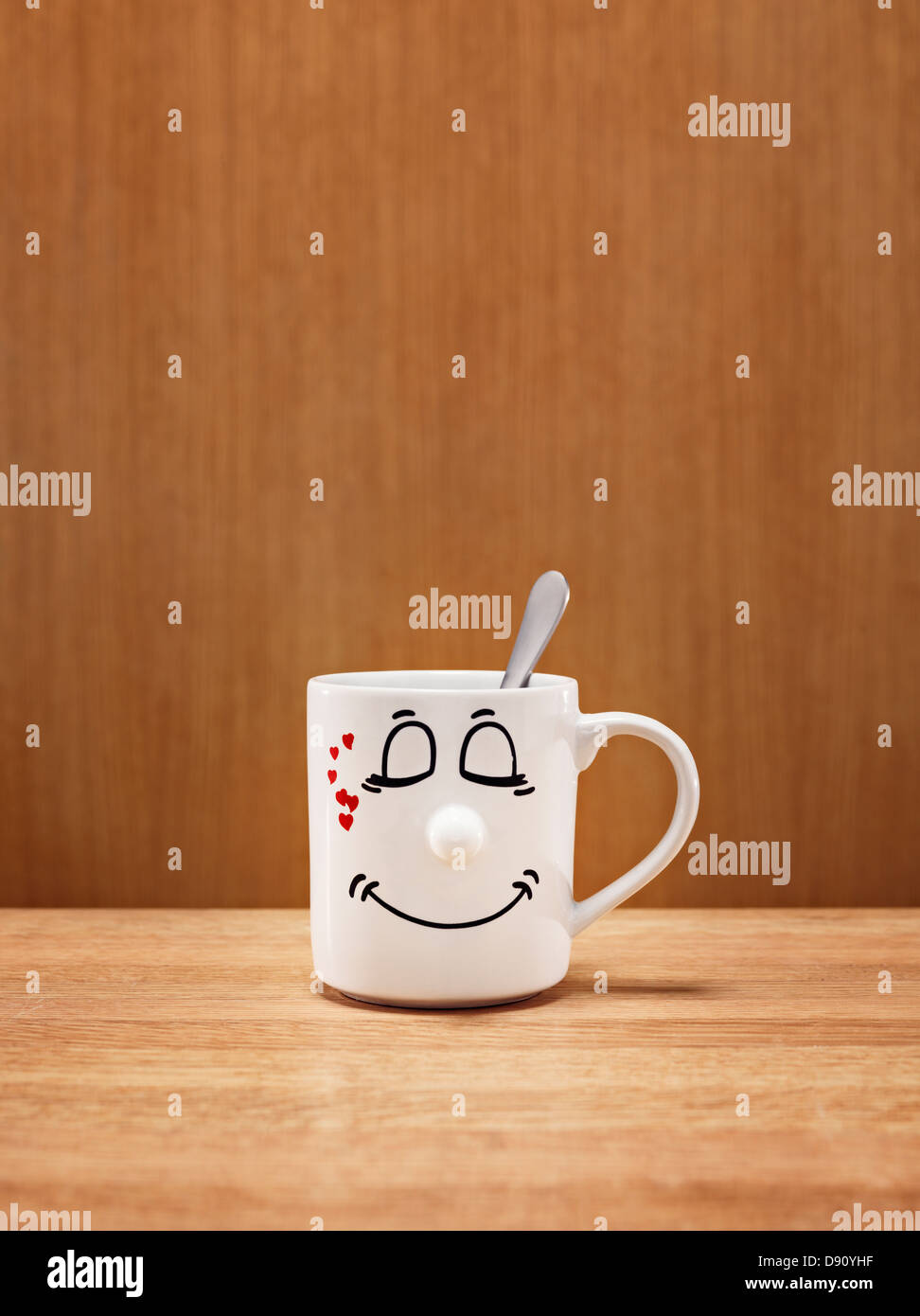 Mug with smiley face Stock Photo