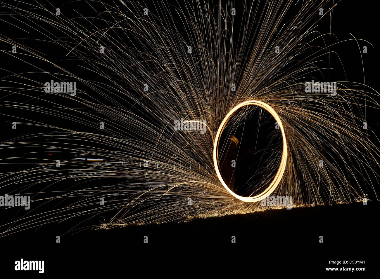 Round circular sparkler with trail of light Stock Photo