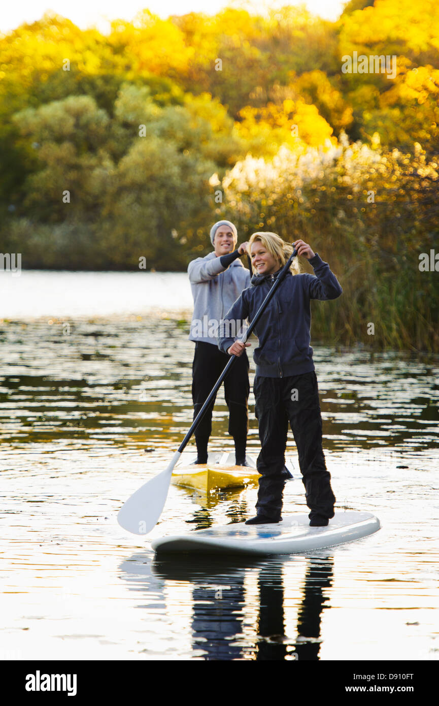 Paddle boards hires stock photography and images Alamy