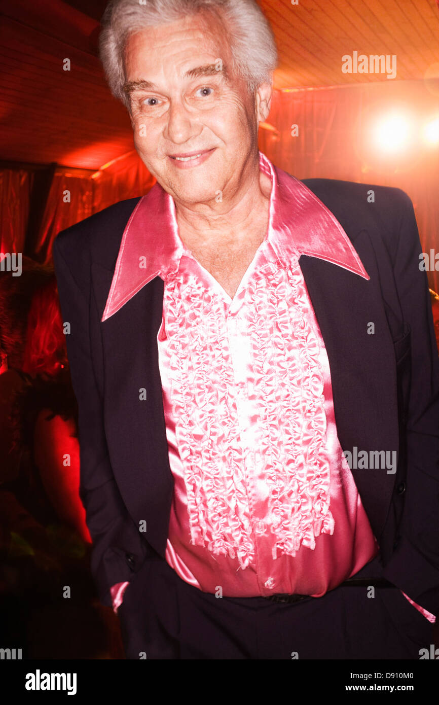 Man in pink shirt hi-res stock photography and images - Alamy