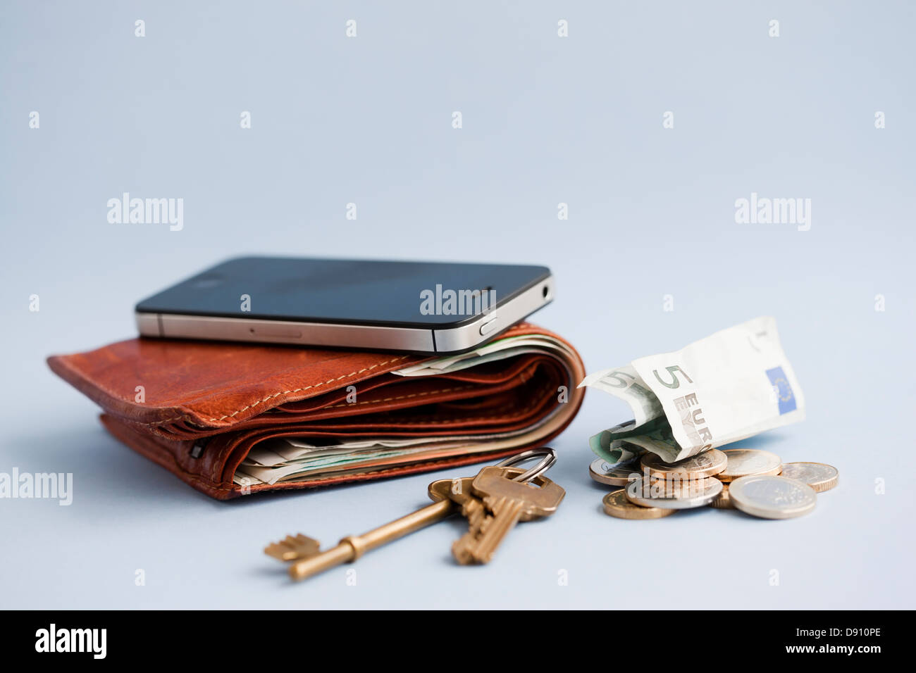 Wallet with cash, phone and keys Stock Photo Alamy