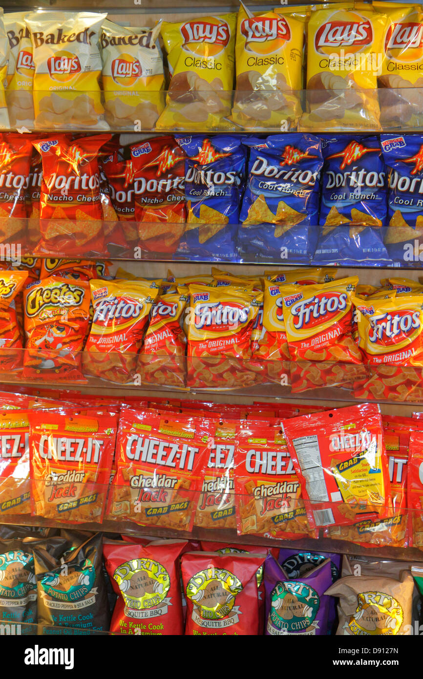 Miami Florida,International Airport,MIA,terminal,gate,snacks,snack food,food,junk,bags,Lay's,Dorito's,Frito's,Cheez-It,potato chips,nacho,display sale Stock Photo