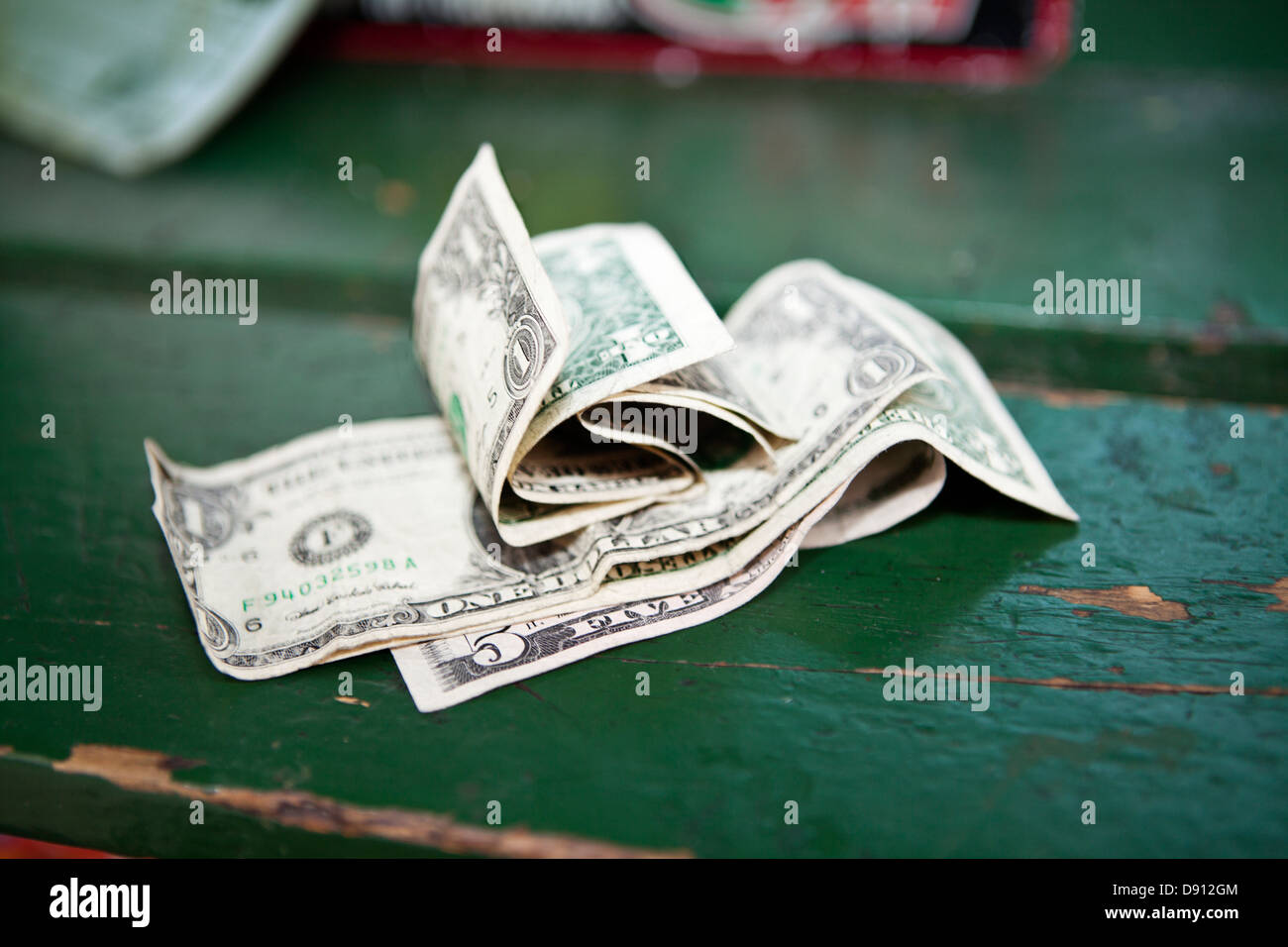 Dollar banknotes on bench Stock Photo - Alamy