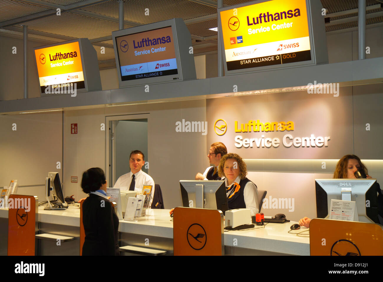 Germany,Europe,Northern,EU,Frankfurt am Main Airport,FRA,terminal,gate,Lufthansa,service center,centre,man men male,woman female women,employee worker Stock Photo