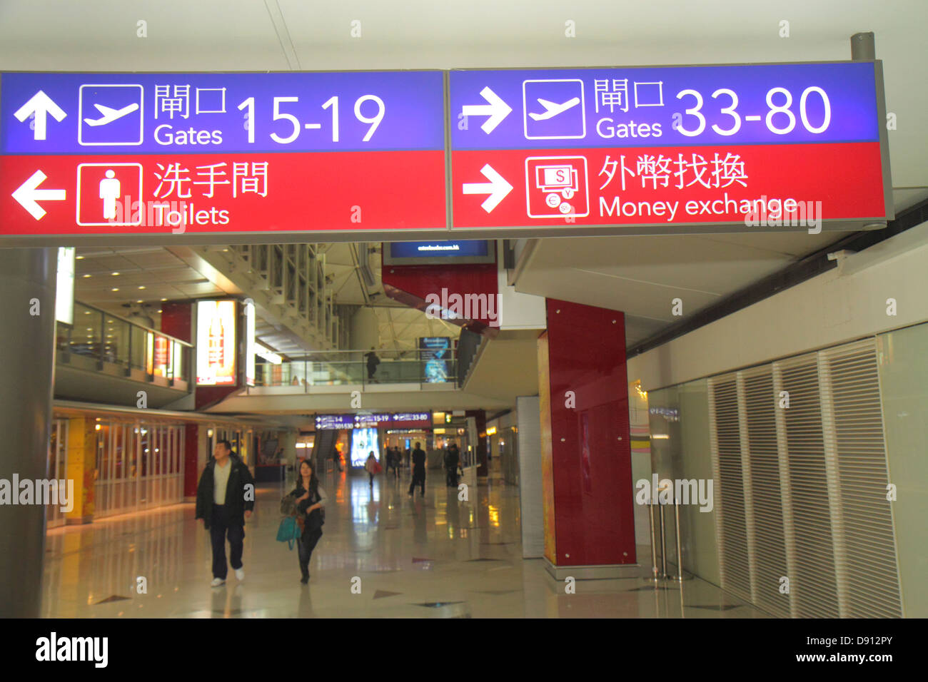 China,Asia,Far East,Orient,Oriental,Hong Kong,International Airport,HKG,terminal,gate,signs,information,directions,hanzi,Chinese,characters,HK13013000 Stock Photo