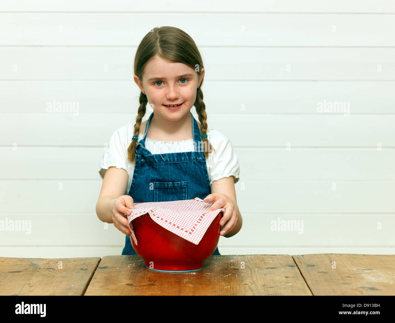 Girl baking cake in kitchen Stock Photo Alamy