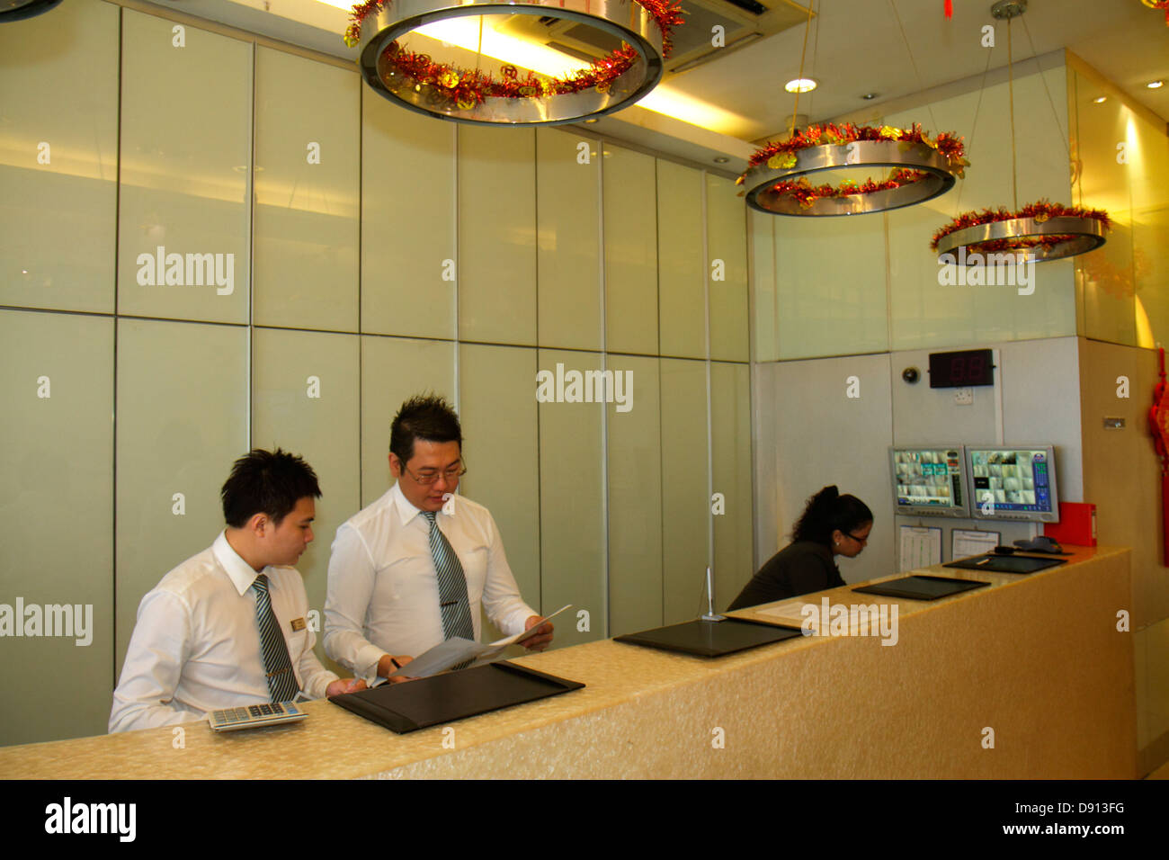 Asians front desk check in reception reservation reservations register