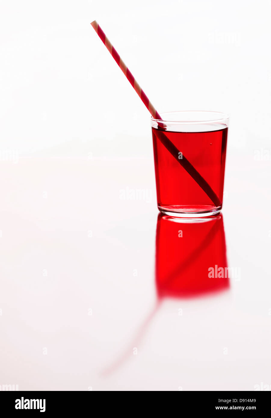 Glass of lemonade with drinking straw Stock Photo