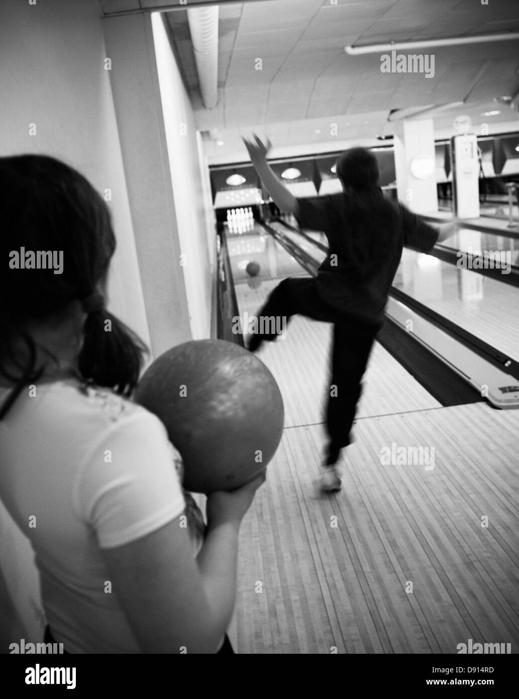 Two children bowling. Stock Photo