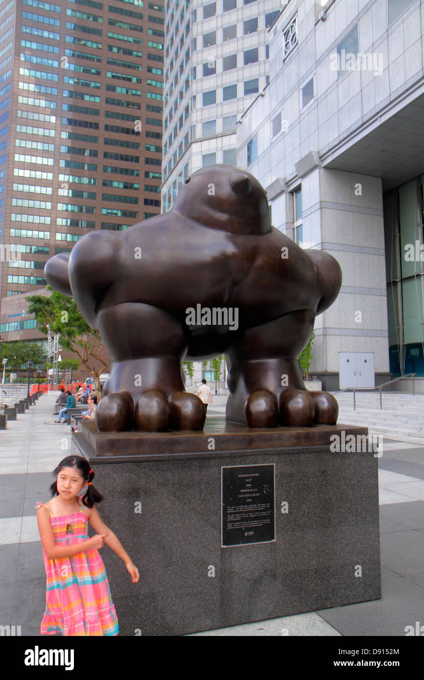 Singapore,Singapore River water,Boat Quay,sculpture,Bird by Botero,Asian Asians ethnic immigrant immigrants minority,girl girls,youngster youngsters y Stock Photo
