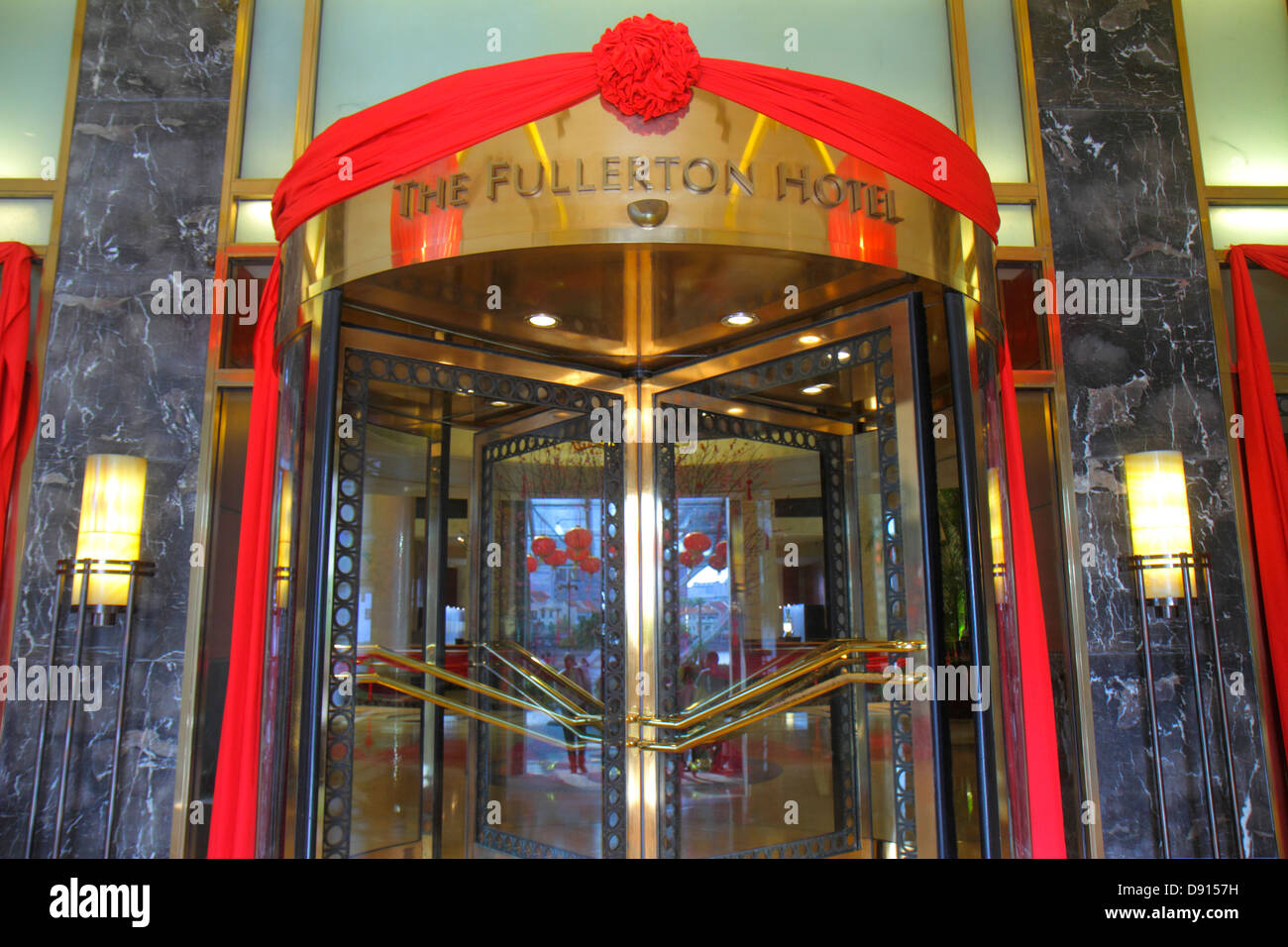 Singapore Singapore River,Boat Quay,The Fullerton,hotel,front,entrance,decorated,Chinese New Year,revolving door,Sing130201164 Stock Photo