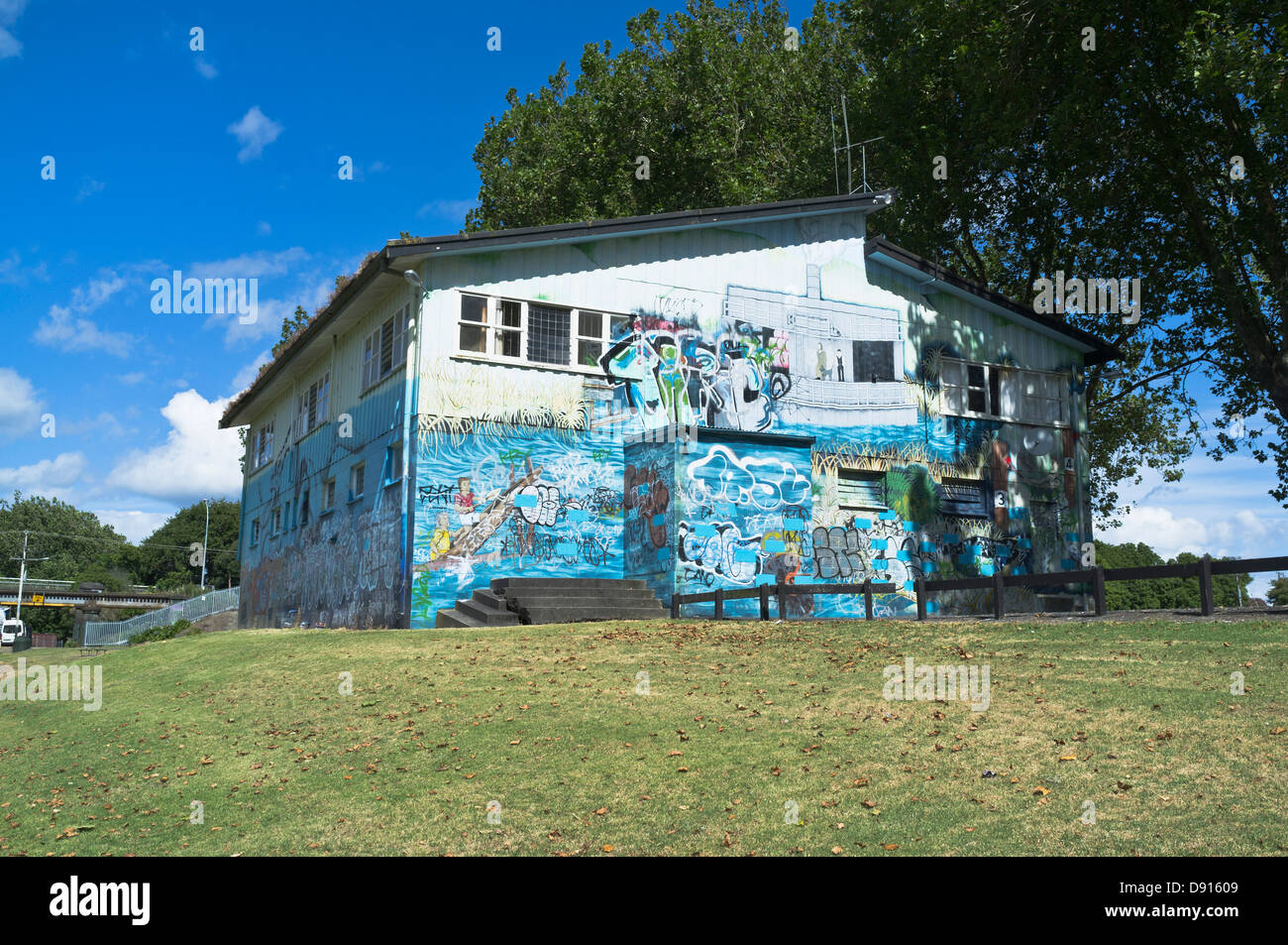 dh NGARUAWAHIA NEW ZEALAND Building with colourful graffiti urban mural