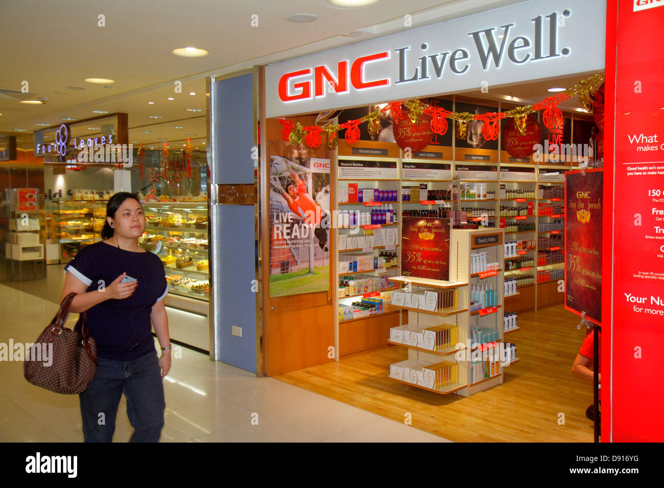 Singapore Bugis Junction shopping GNC Live Well front entrance Stock