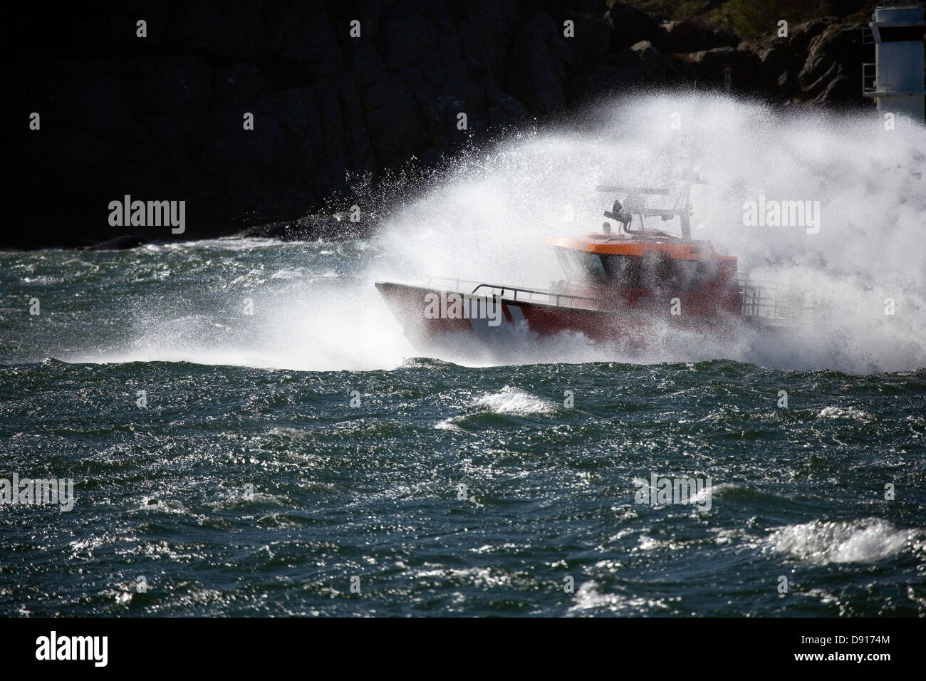 A pilot boat speeding Stock Photo - Alamy