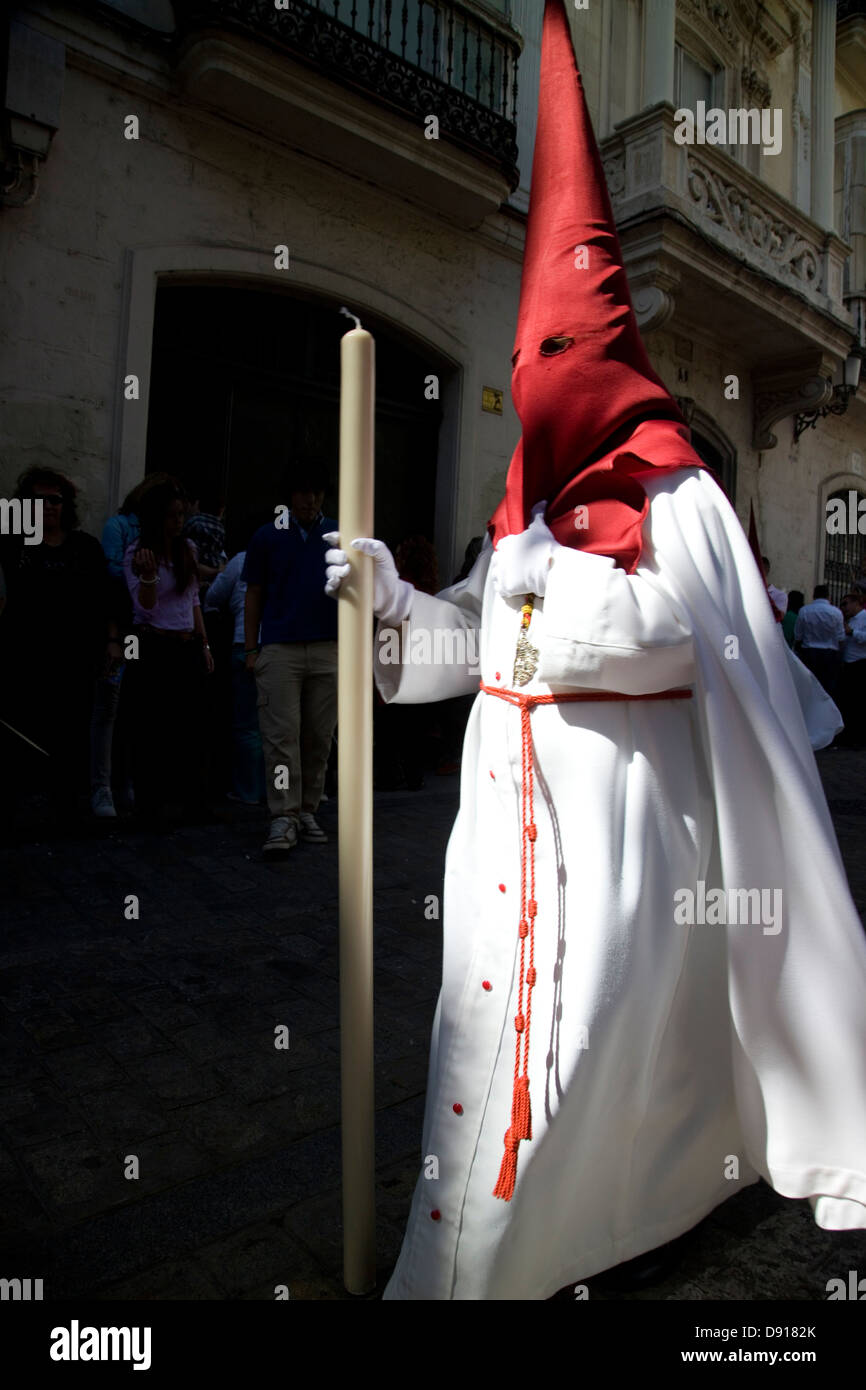 Traditional costumes for the Catholic Festival of Semana Santa, Cadiz, Andalucia, Spain. Stock Photo