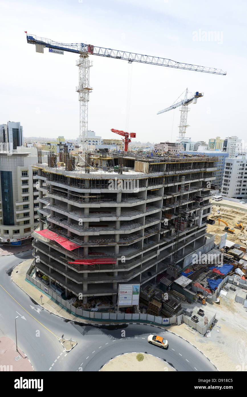 Dubai building industry, construction work being carried out in the city of Dubai, United Arab Emirates Stock Photo