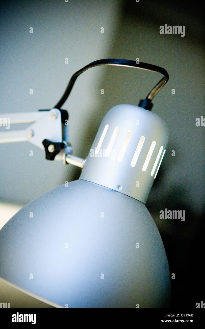 A lamp on a desk. Stock Photo