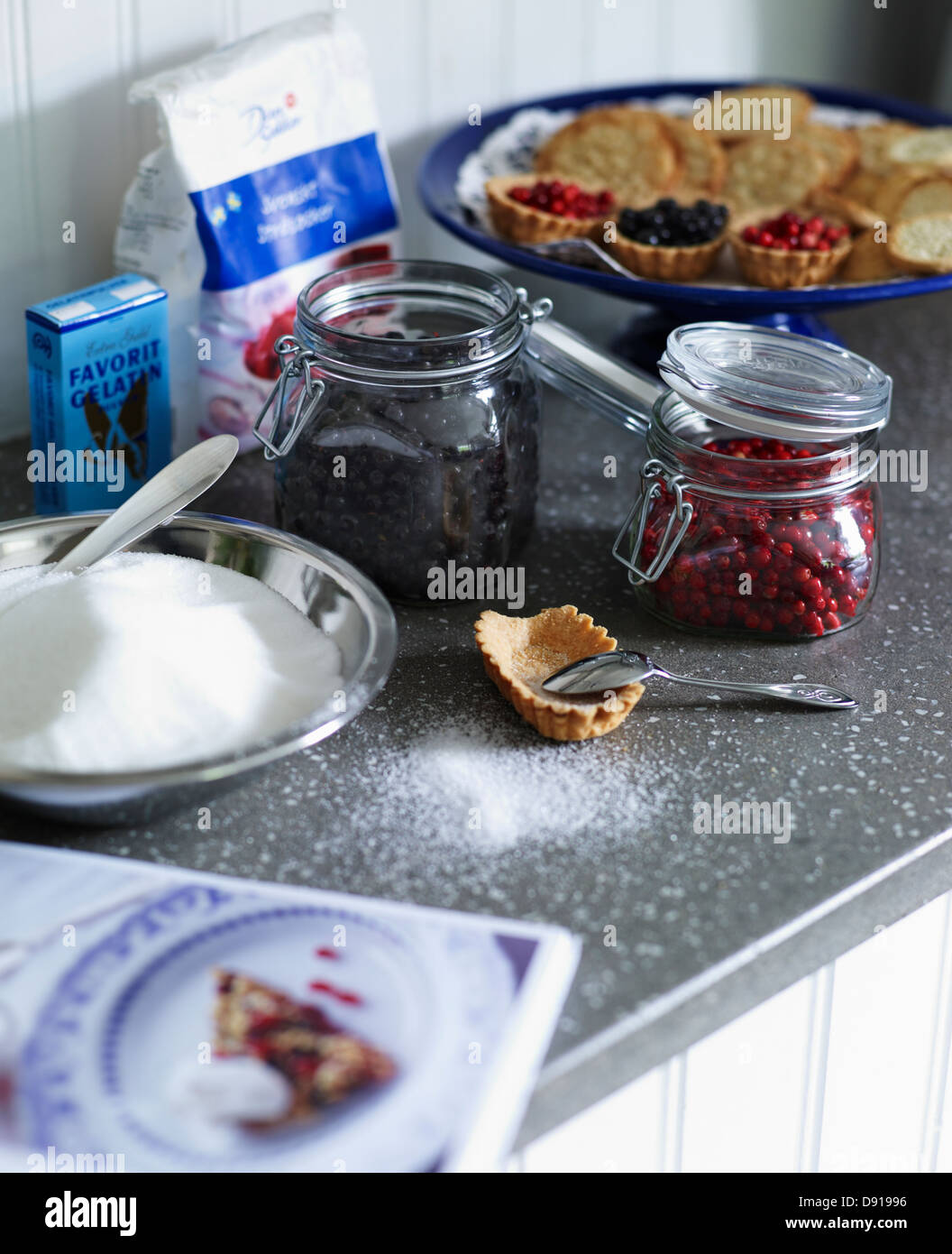 Lingonberry, cookies and bilberry on a worktop, Sweden Stock Photo - Alamy