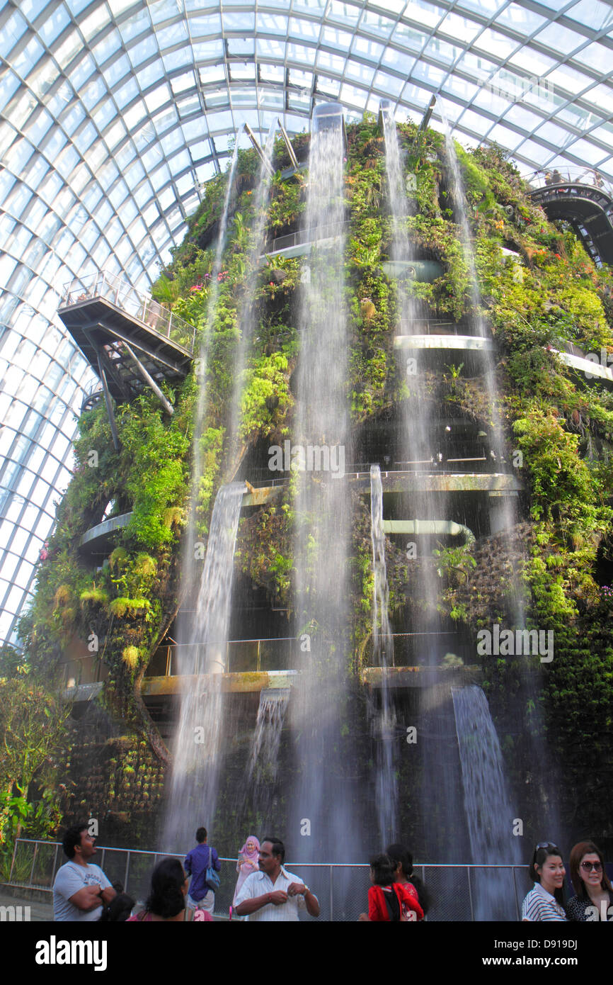 Singapore Gardens by the Bay,park,Cloud Forest,mountain,greenhouse,waterfall,Asian family families parent parents child children,man men male,woman fe Stock Photo