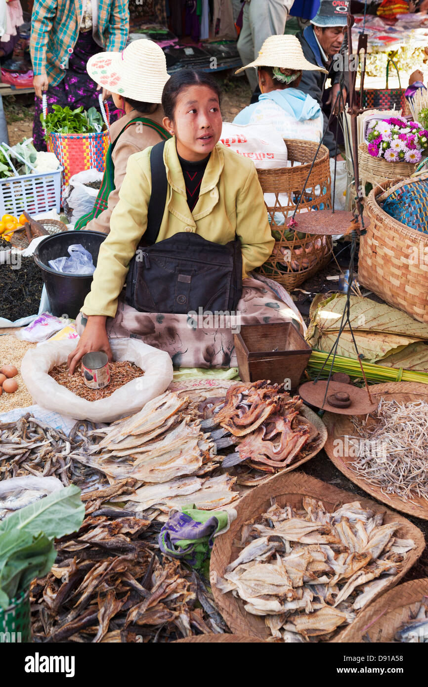 Woman selling dried fish, market day at a small village by Lake Inle, Myanmar 2 Stock Photo