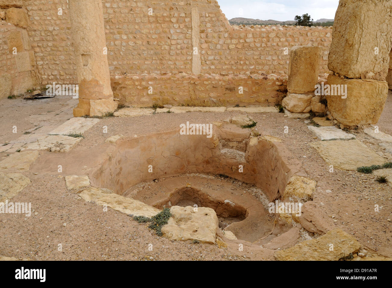 Baptismal Font in the ruins of the roman city of Sbeitla or Sufetla near Kasserine Tunisia Stock Photo