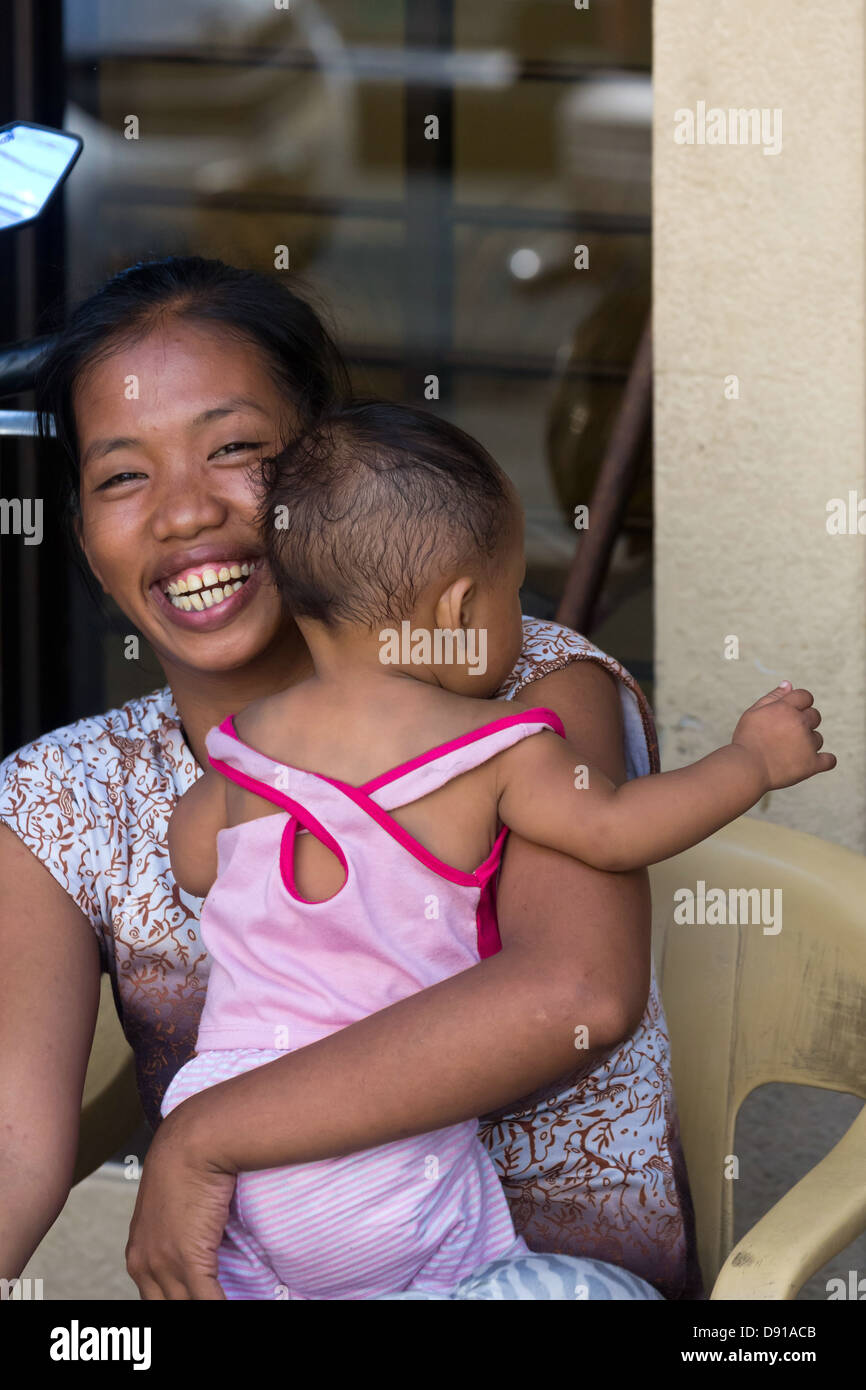 Woman with Baby in Manila, Philippines Stock Photo Alamy