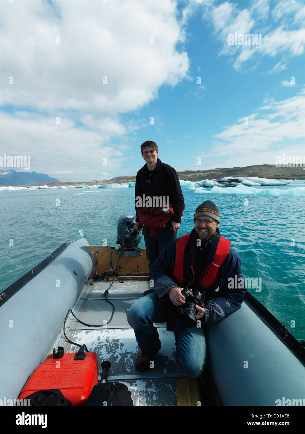 Two men in rubber boat hi-res stock photography and images - Alamy