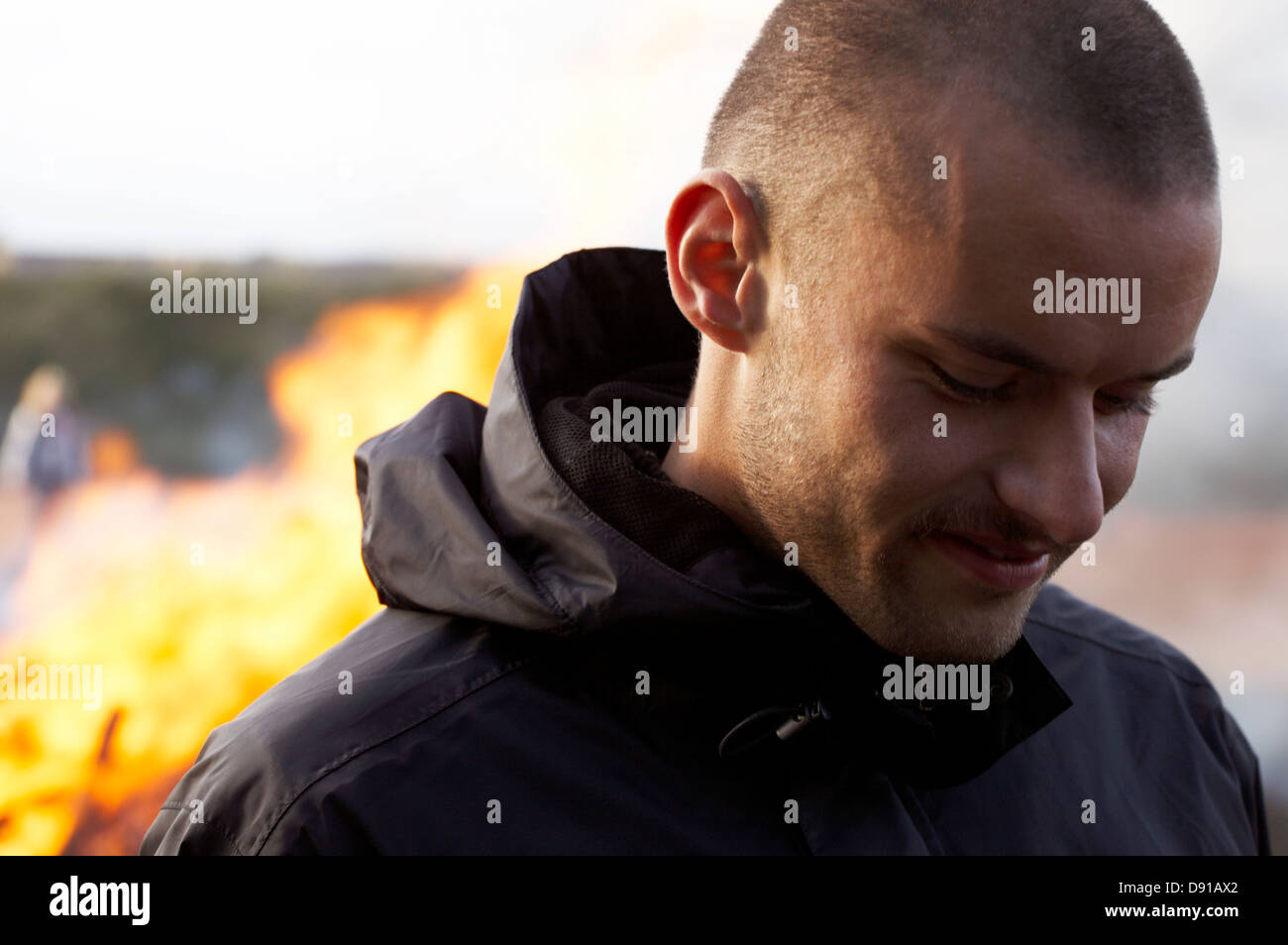 A man by a fire, Denmark. Stock Photo