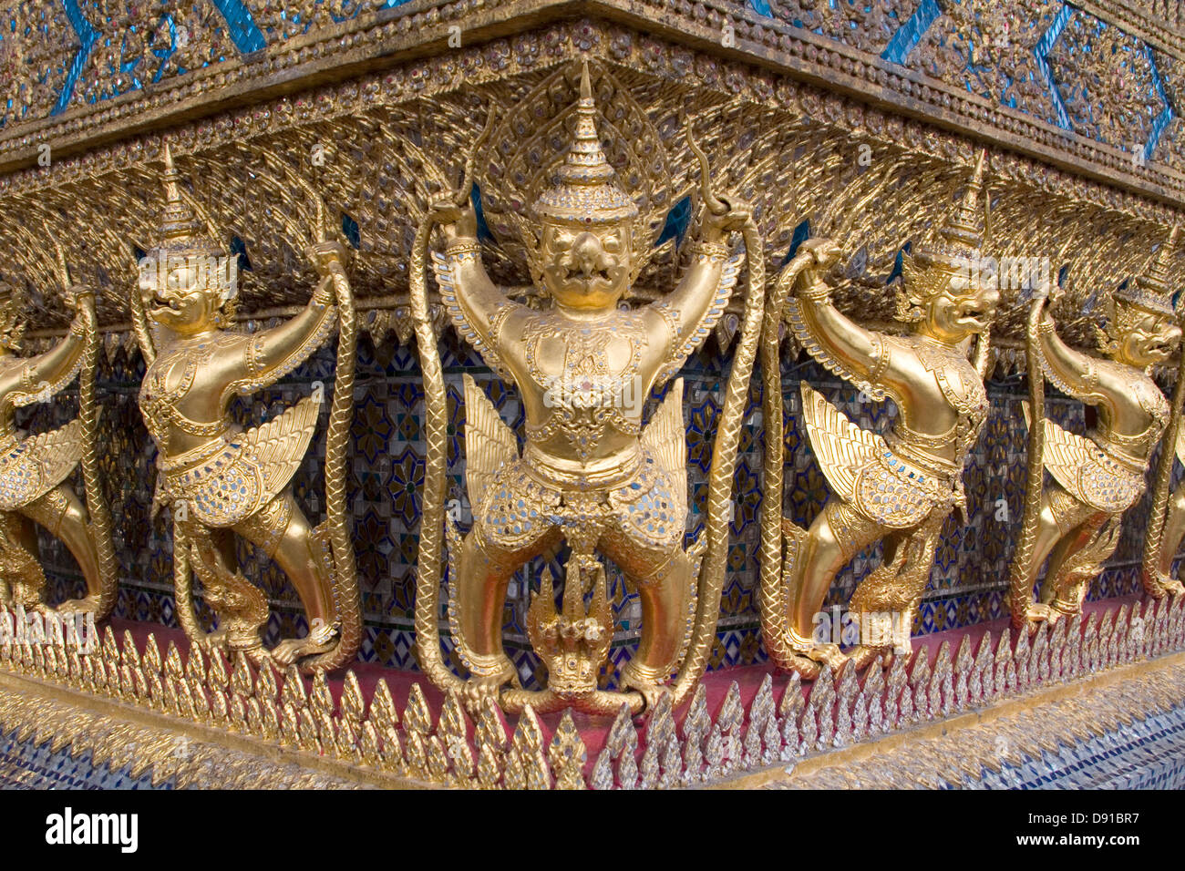 Decoration on the outer walls of the Temple of the Emerald Buddha, or Wat Phra Gaeo, Bangkok, Thailand. Stock Photo
