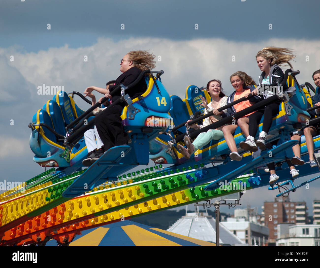 People enjoying themselves on an amusement ride on Brighton Pier Stock ...