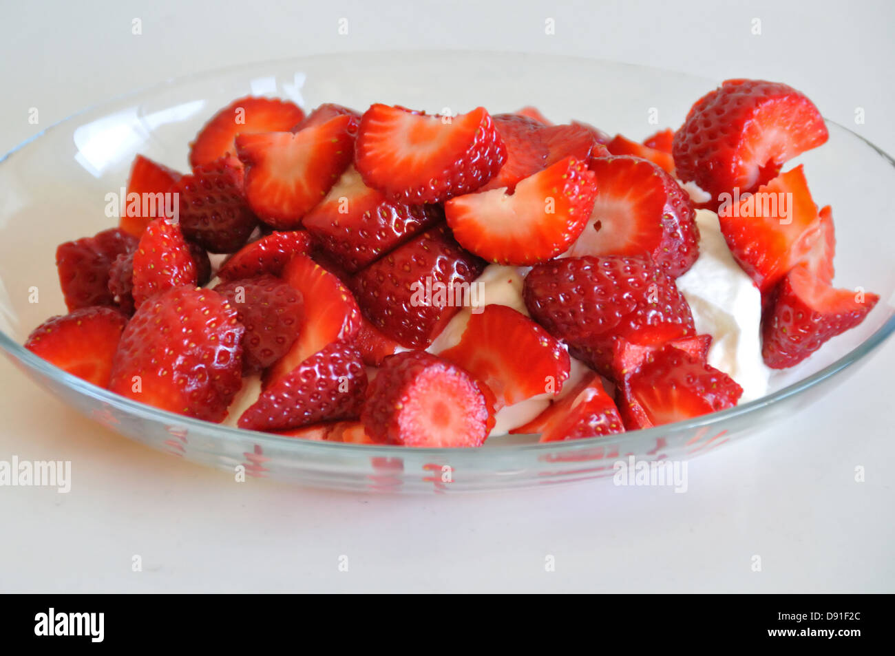 Fresh strawberries and yogurt dessert fruit background. Stock Photo