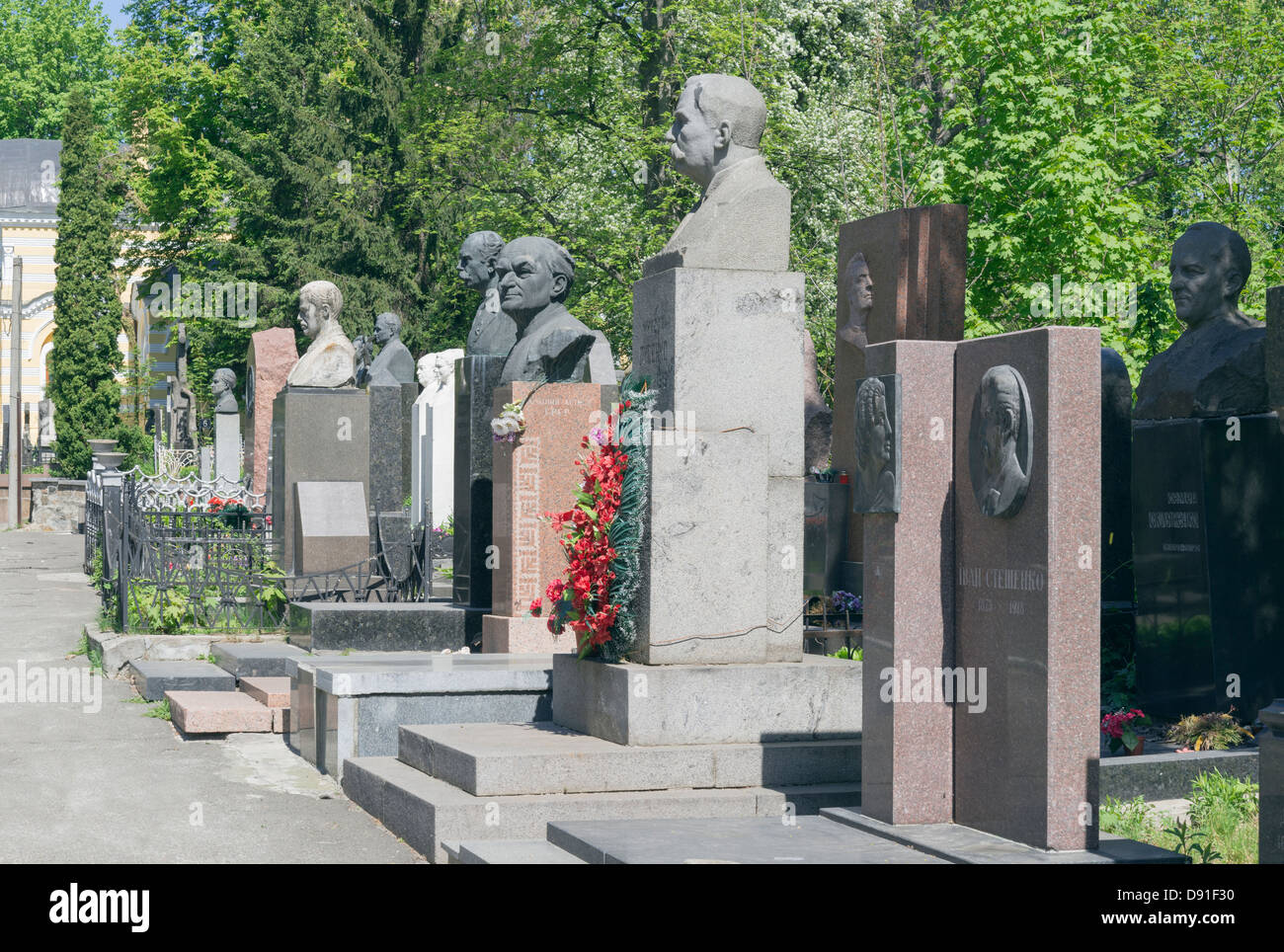 Central alley of Baykove cemetery in Kiev. Graves of Ukrainian composers, actors and writers Stock Photo