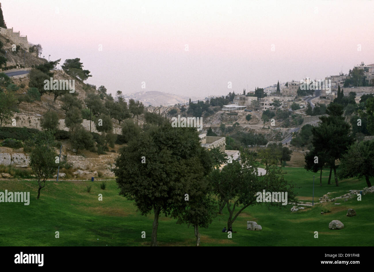 View toward Valley of Hinnom or Gei Ben Hinom Valley Park the modern name for the biblical Gehenna or Gehinnom valley surrounding Jerusalem's Old City, Israel Stock Photo