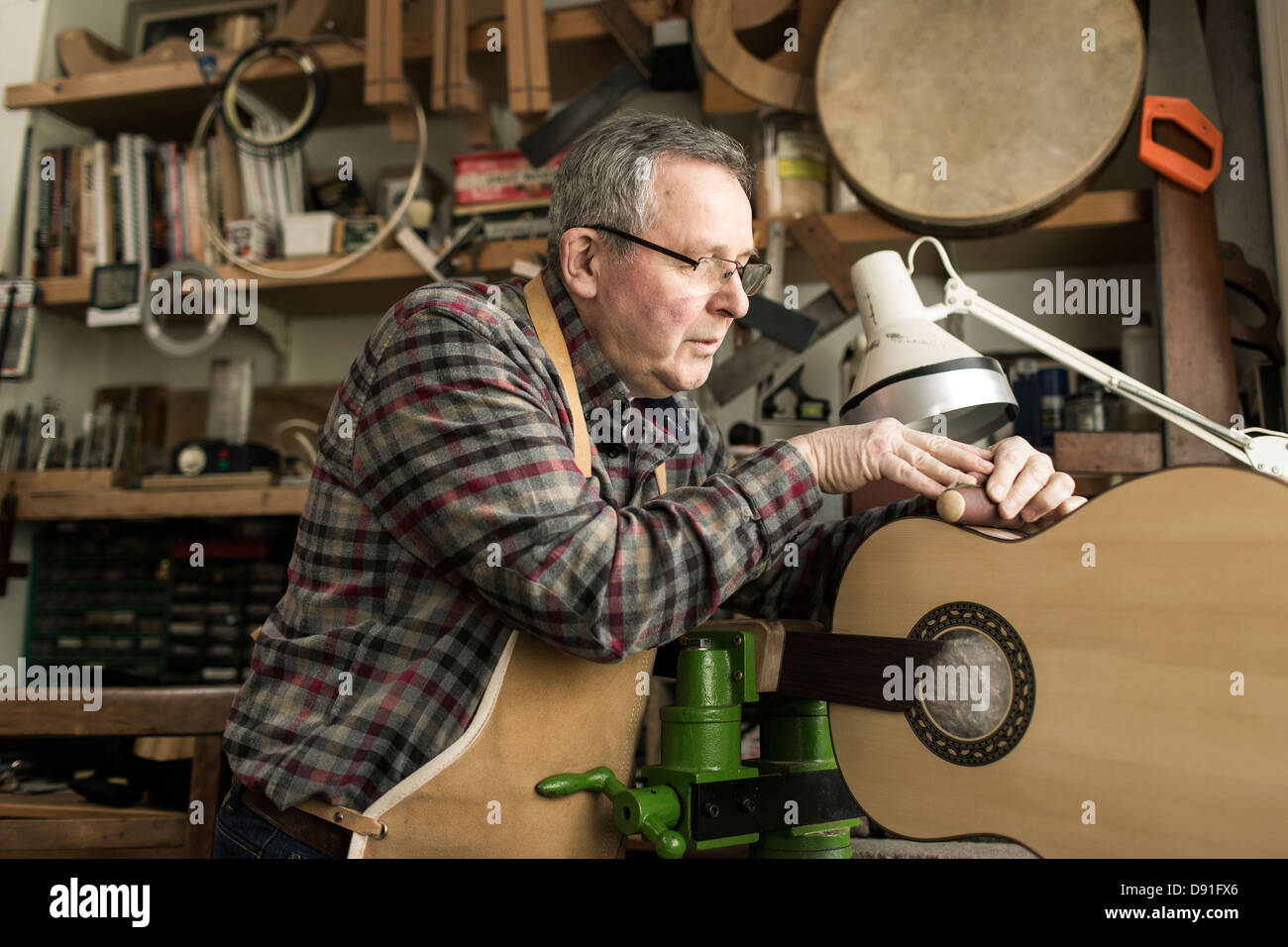 Stringed Instrument Maker Stock Photos & Stringed Instrument Maker