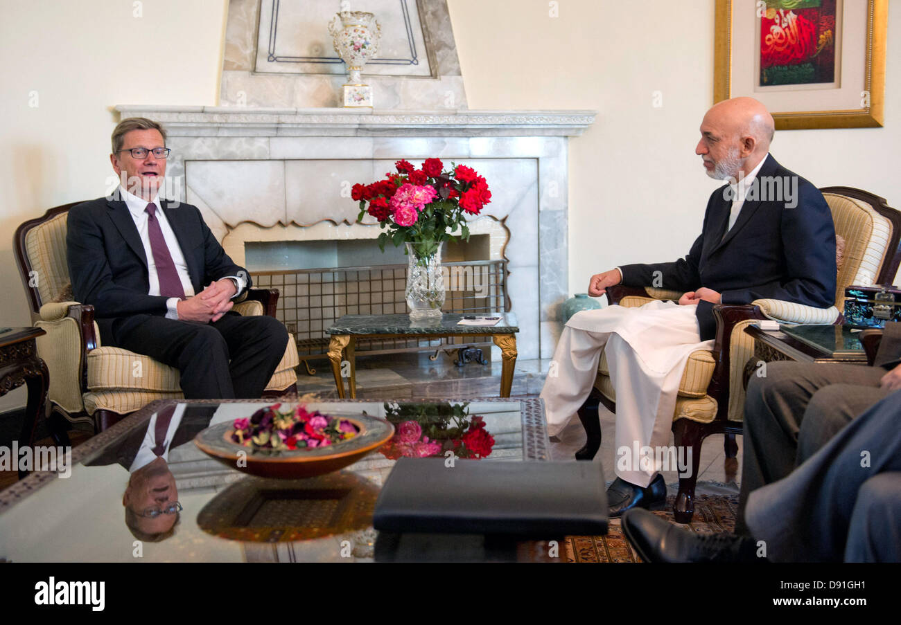 Kabul, Afghanistan, 8 June 2013. German Foreign Minister Guido Westerwelle (L) talks to President of Afghanistan Hamid Karsai in Kabul, Afghanistan, 08 June 2013. Westerwelle expressed, that he is interested in the retreat of international strike forces. Credit:  dpa picture alliance/Alamy Live News Stock Photo