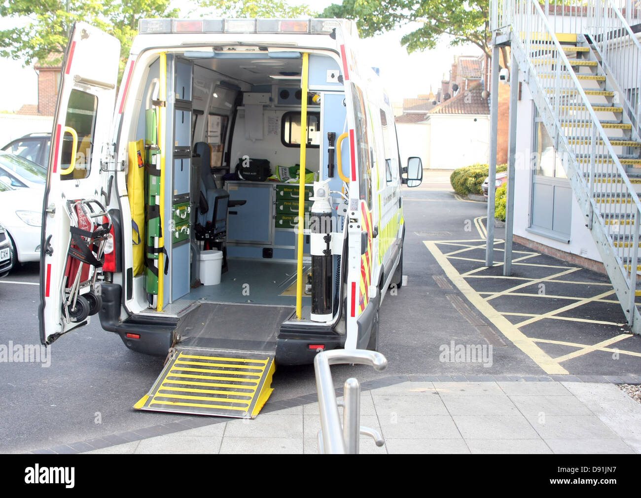 Rear view of an Ambulance with its doors wide open and ramp down, June 2013 Stock Photo