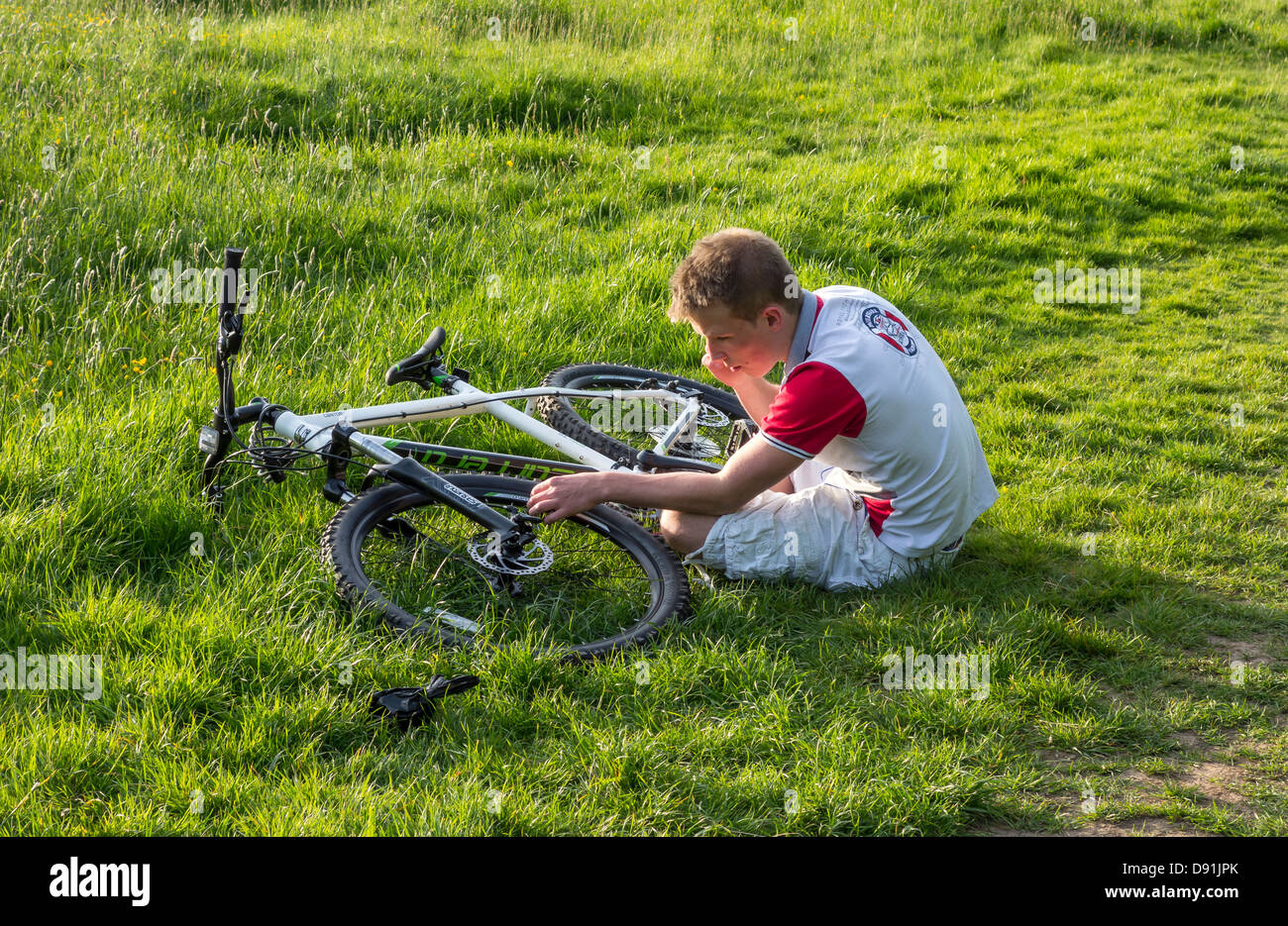 Boy Youth Mending Repairing Bike Bicycle Stock Photo