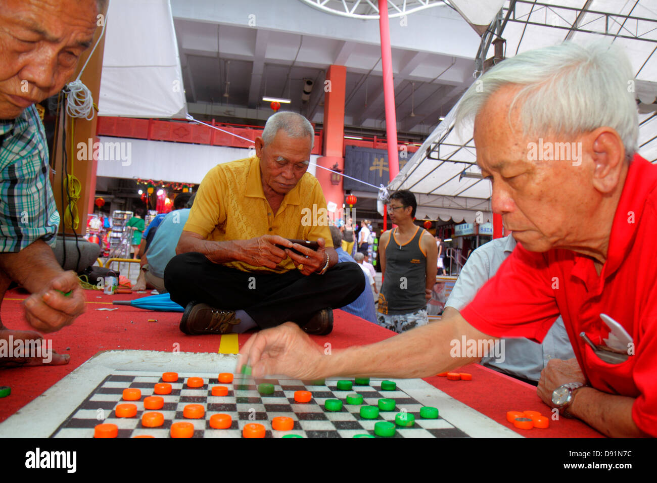 Singapore Chinatown Asian Man Playing Checkers Draughts Board Game 