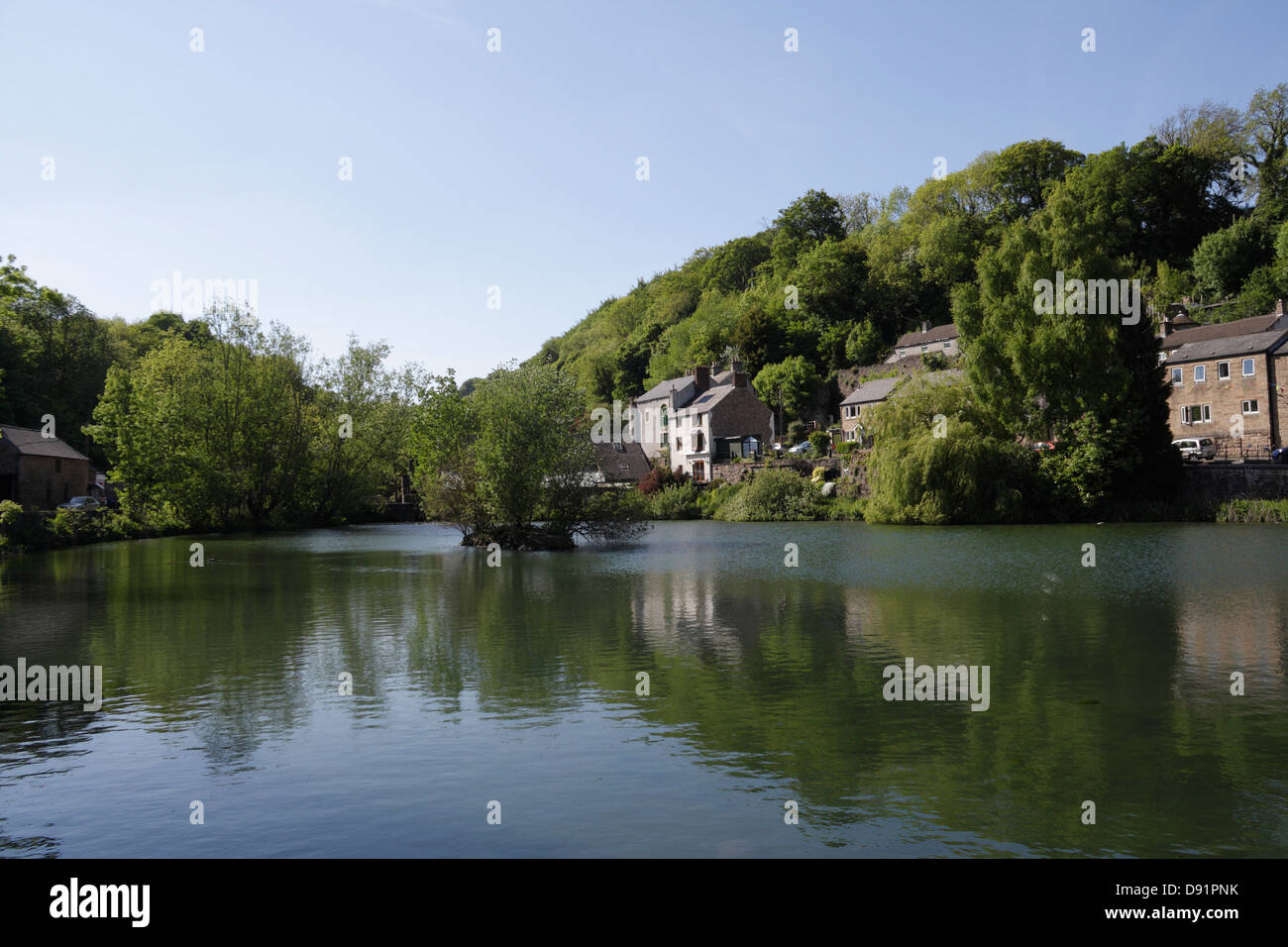 Scenic Cromford Mill Pond in Cromford village Derbyshire England UK Stock Photo